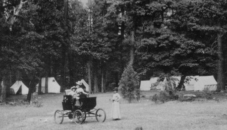 One of the first cars to reach Yosemite at Camp Curry