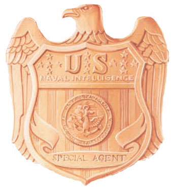 The seal of the Naval Investigative Service. Click Image To Go To Amazon