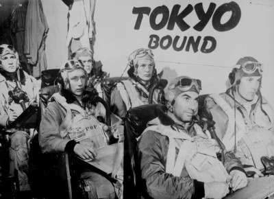 "Tokyo Bound". World War II Navy pilots are briefed
